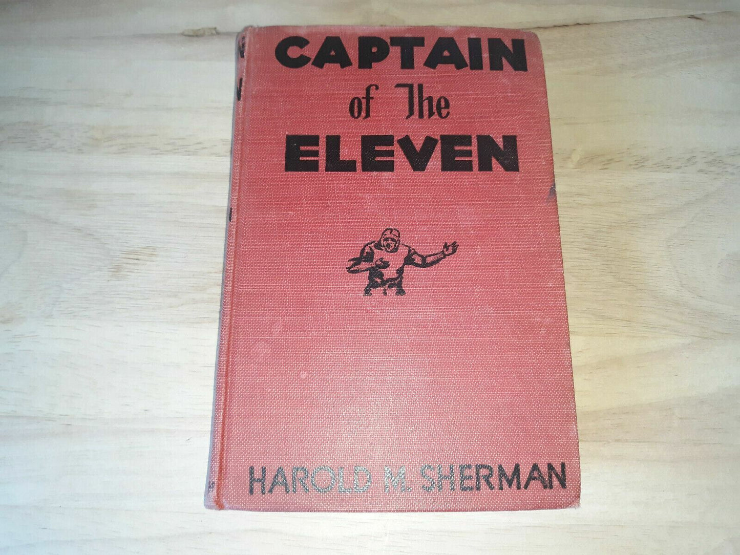 1933 Hardcover "Captain of the Eleven" written by Harold M. Sherman