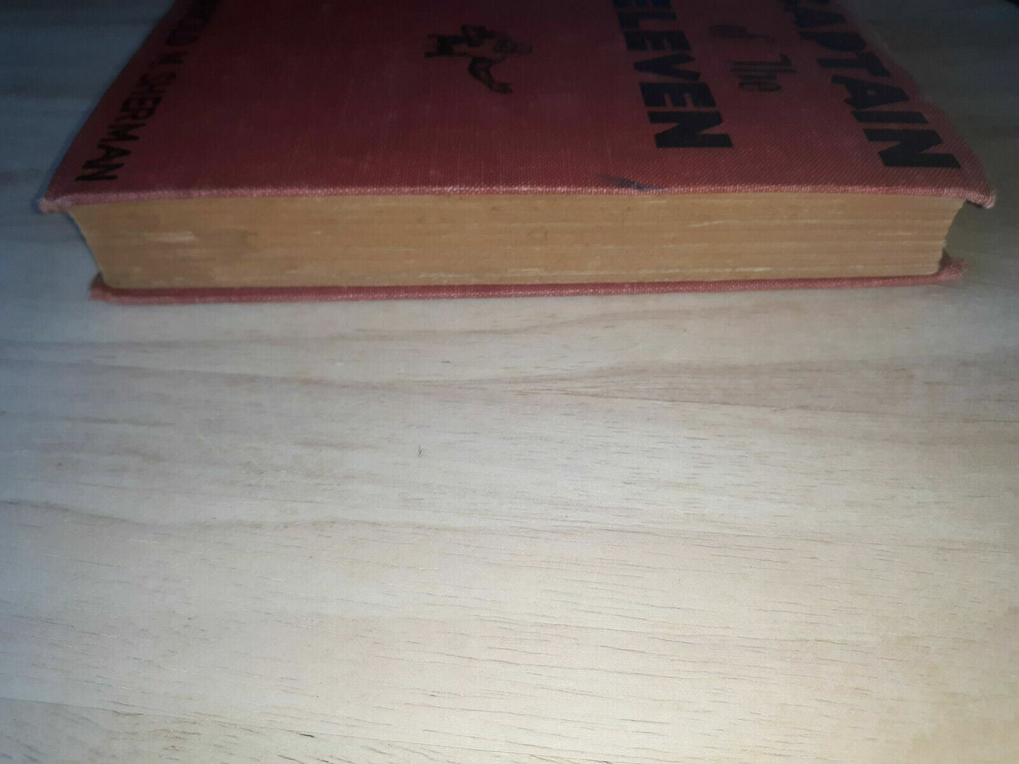 1933 Hardcover "Captain of the Eleven" written by Harold M. Sherman