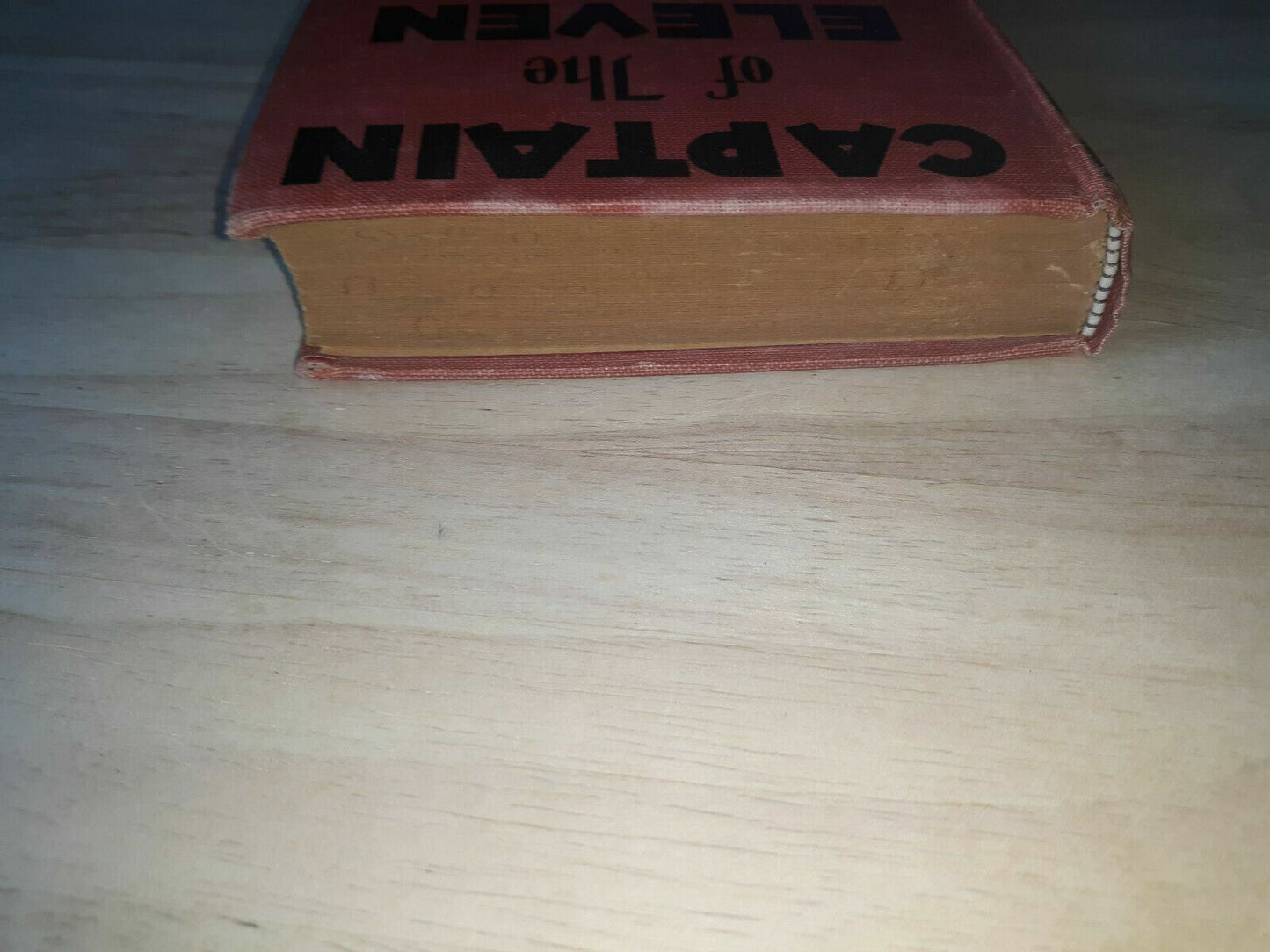 1933 Hardcover "Captain of the Eleven" written by Harold M. Sherman