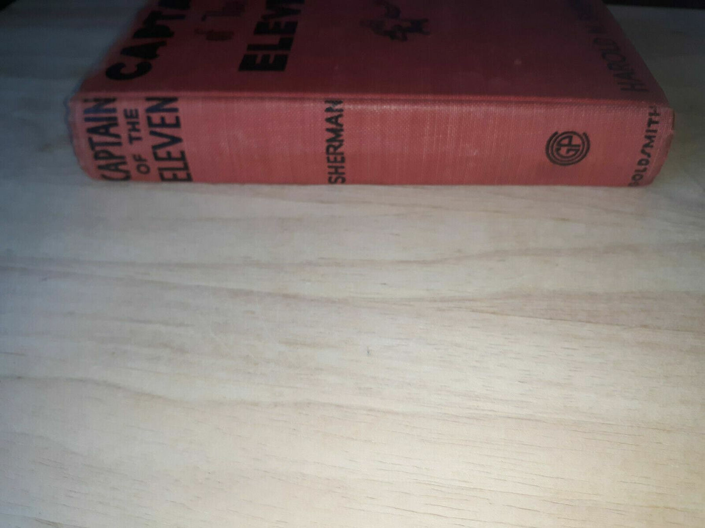 1933 Hardcover "Captain of the Eleven" written by Harold M. Sherman